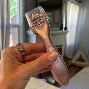 Rose gold GloPro with two brush head sizes + charging cord